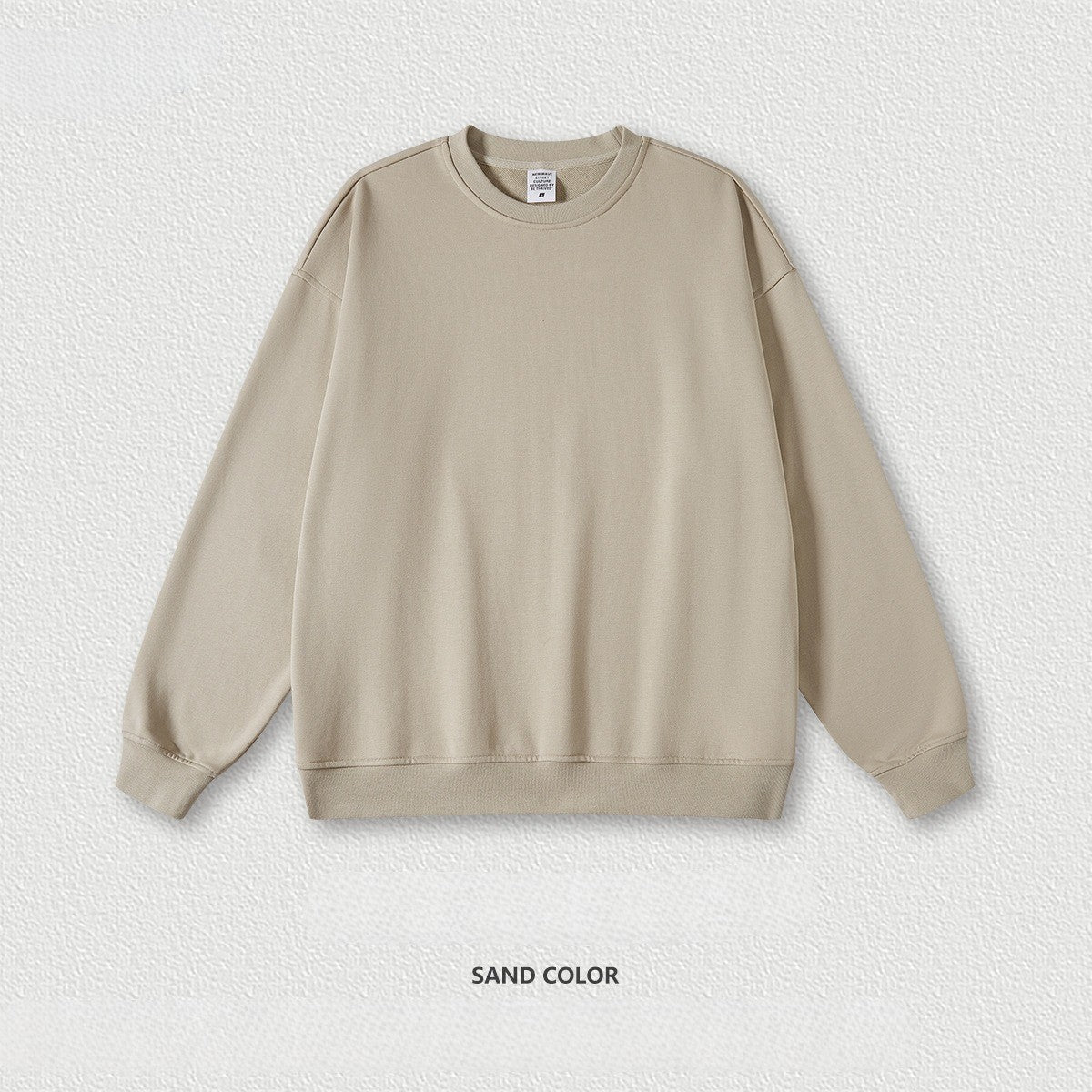 เสื้อฮู้ดคอกลมทรงหลวม ทำจากผ้าขนสัตว์แบบห่วง 440 กรัม สีพื้น มีให้เลือก 11 สี