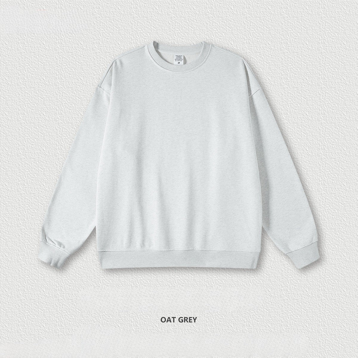 เสื้อฮู้ดคอกลมทรงหลวม ทำจากผ้าขนสัตว์แบบห่วง 440 กรัม สีพื้น มีให้เลือก 11 สี