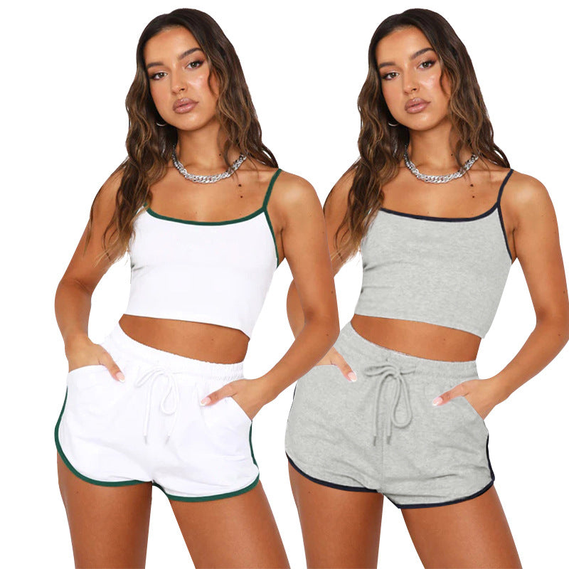 211302 ชุดเสื้อครอปสายคล้องคอเซ็กซี่สีพื้น กางเกงขายาวผูกเชือก 2 สี