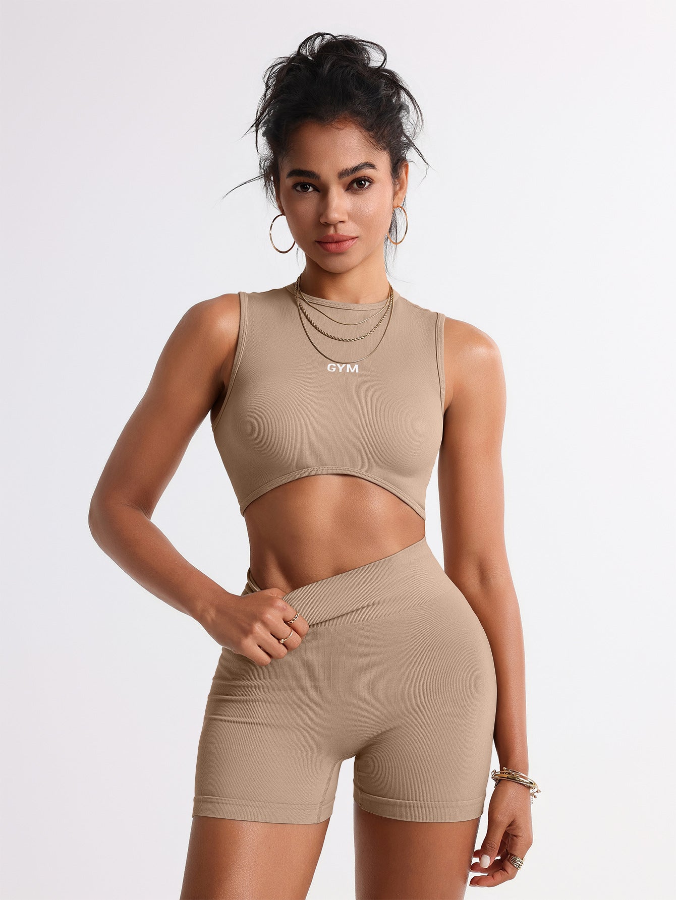 ชุดโยคะรัดรูปไร้ตะเข็บสำหรับผู้หญิง ช่วยเก็บหน้าท้อง สวมใส่คู่กับเสื้อกล้ามออกกำลังกายและกางเกงขาสั้นทรงสะโพกสวย