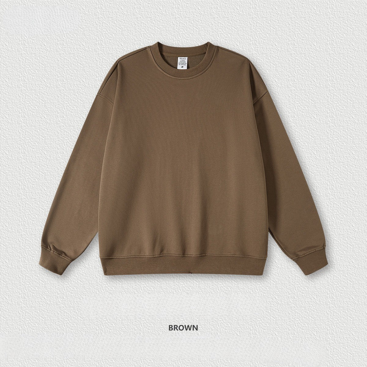เสื้อฮู้ดคอกลมทรงหลวม ทำจากผ้าขนสัตว์แบบห่วง 440 กรัม สีพื้น มีให้เลือก 11 สี